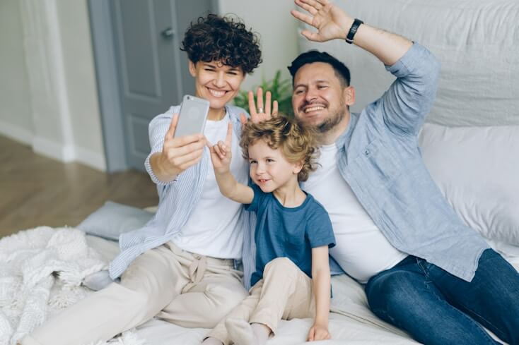 Happy father and children